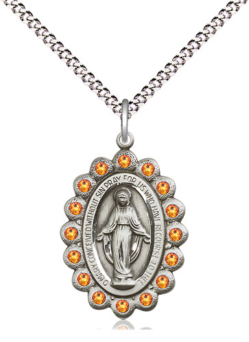 Sterling Silver Miraculous Pendant with Topaz Swarovski stones on a 18 inch Light Rhodium Light Curb chain