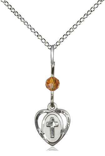 Sterling Silver Heart Cross Pendant with a Topaz bead on a 18 inch Sterling Silver Light Curb chain